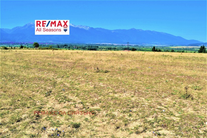 Продава ПАРЦЕЛ в област Благоевград, с. Баня - 5500 кв.м / 272 000 € » 531 985.76 лв., РЕМАКС ОЛ СИЙЗЪНС